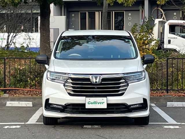 ホンダ オデッセイ ハイブリッド e:HEVアブソルート EX 宮城県 2021(令3)年 5.5万km プラチナホワイトパール ホンダセンシング/・衝突軽減ブレーキ/・誤発進抑制機能/・路外逸脱抑制機能/・レーンキープアシストシステム/・アダプティブ・クルーズ・コントロール/・先行者発進お知らせ機能/・標識認識機能/・ブラインドスポットインフォメーション/純正ナビ（VXU-217DYi）/・全方位カメラ/・Bluetooth/CD/DVD/フルセグTV/HDMI/・前後ドライブレコーダー/・ETC2.0/フリップダウンモニター/両側パワースライドドア/電動リアゲート/アイドリングストップ/デジタルインナーミラー/電子パーキング/・オートブレーキホールド/前後コーナーセンサー/革巻きステアリング/・ステアリングリモコン/プッシュスタート/・スマートキー/シートカバー/・パワーシート（運転席/助手席）/・シートヒーター（運転席/助手席）/・オットマン（2列目）/LEDヘッドライト/・オートライト/・フォグランプ/純正アルミホイール/純正フロアマット/ドアバイザー