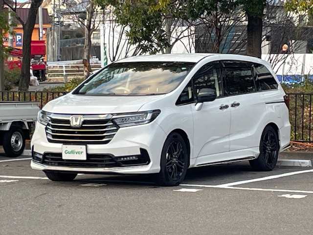 ホンダ オデッセイ ハイブリッド e:HEVアブソルート EX 宮城県 2021(令3)年 5.5万km プラチナホワイトパール ホンダセンシング/・衝突軽減ブレーキ/・誤発進抑制機能/・路外逸脱抑制機能/・レーンキープアシストシステム/・アダプティブ・クルーズ・コントロール/・先行者発進お知らせ機能/・標識認識機能/・ブラインドスポットインフォメーション/純正ナビ（VXU-217DYi）/・全方位カメラ/・Bluetooth/CD/DVD/フルセグTV/HDMI/・前後ドライブレコーダー/・ETC2.0/フリップダウンモニター/両側パワースライドドア/電動リアゲート/アイドリングストップ/デジタルインナーミラー/電子パーキング/・オートブレーキホールド/前後コーナーセンサー/革巻きステアリング/・ステアリングリモコン/プッシュスタート/・スマートキー/シートカバー/・パワーシート（運転席/助手席）/・シートヒーター（運転席/助手席）/・オットマン（2列目）/LEDヘッドライト/・オートライト/・フォグランプ/純正アルミホイール/純正フロアマット/ドアバイザー