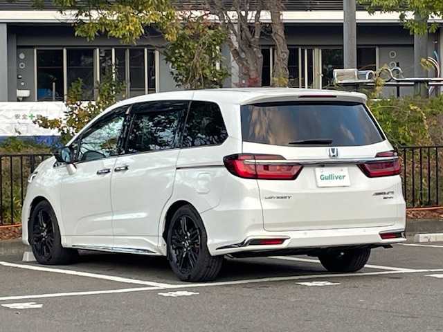 ホンダ オデッセイ ハイブリッド e:HEVアブソルート EX 宮城県 2021(令3)年 5.5万km プラチナホワイトパール ホンダセンシング/・衝突軽減ブレーキ/・誤発進抑制機能/・路外逸脱抑制機能/・レーンキープアシストシステム/・アダプティブ・クルーズ・コントロール/・先行者発進お知らせ機能/・標識認識機能/・ブラインドスポットインフォメーション/純正ナビ（VXU-217DYi）/・全方位カメラ/・Bluetooth/CD/DVD/フルセグTV/HDMI/・前後ドライブレコーダー/・ETC2.0/フリップダウンモニター/両側パワースライドドア/電動リアゲート/アイドリングストップ/デジタルインナーミラー/電子パーキング/・オートブレーキホールド/前後コーナーセンサー/革巻きステアリング/・ステアリングリモコン/プッシュスタート/・スマートキー/シートカバー/・パワーシート（運転席/助手席）/・シートヒーター（運転席/助手席）/・オットマン（2列目）/LEDヘッドライト/・オートライト/・フォグランプ/純正アルミホイール/純正フロアマット/ドアバイザー