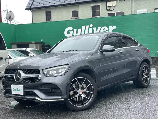 メルセデス・ベンツ ＧＬＣ３５０ｅ 4マチック クーペ AMGライン 東京都 2020(令2)年 5.4万km セレナイトグレー ○ワンオーナー/○純正メーカーナビ/○革シート/○サンルーフ/○全方位カメラ/○ドライブレコーダー/○パドルシフト/○ステアリングスイッチ/○ACC/○LKA/○BSM/○アクティブステリングアシスト/○HUD/○前席3wayメモリーシート/○全席シートヒーター/○前席エアーシート/○ブルメスターサウンドシステム/○社外20インチアルミホイール/○保証書/○取扱説明書/○スペアキー