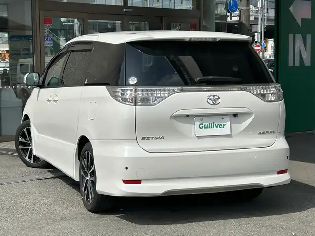 トヨタ エスティマ アエラス 兵庫県 2013(平25)年 8.4万km ホワイトパールクリスタルシャイン 純正8インチナビ/（CD/DVD/BT/フルセグTV）/純正フリップダウンモニター/バックカメラ/両側パワースライドドア/ビルトインETC/HIDヘッドライト/AUTOライト/スマートキー/スペアキー/保証書