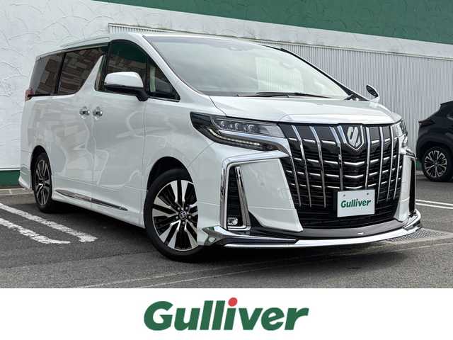 トヨタ アルファード S Cパッケージ 徳島県 2023(令5)年 0.9万km ホワイトパールクリスタルシャイン 純正9インチナビ/(フルセグTV/Bluetooth/AM/FM/USB)/モデリスタフルエアロ/純正フリップダウンモニター/トヨタセーフティセンス/BSM/バックカメラ/シーケンシャル/デジタルインナーミラー/シートメモリ/ステアリングヒーター/オートブレーキホールド/TVキャンセラー/前フォグライト/両側パワースライドドア