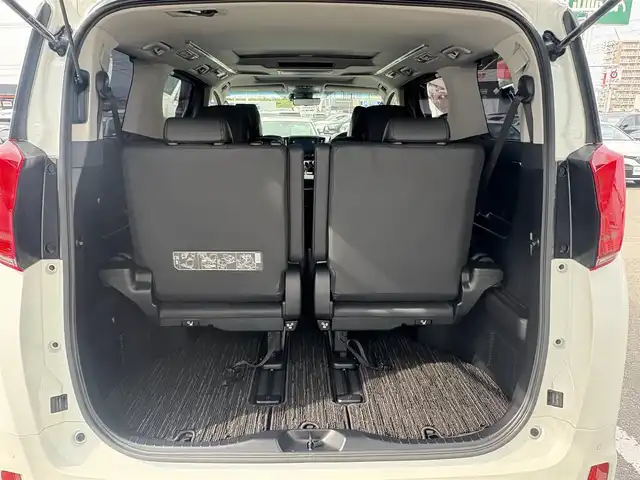 トヨタ アルファード S Cパッケージ 徳島県 2023(令5)年 0.9万km ホワイトパールクリスタルシャイン 純正9インチナビ/(フルセグTV/Bluetooth/AM/FM/USB)/モデリスタフルエアロ/純正フリップダウンモニター/トヨタセーフティセンス/BSM/バックカメラ/シーケンシャル/デジタルインナーミラー/シートメモリ/ステアリングヒーター/オートブレーキホールド/TVキャンセラー/前フォグライト/両側パワースライドドア