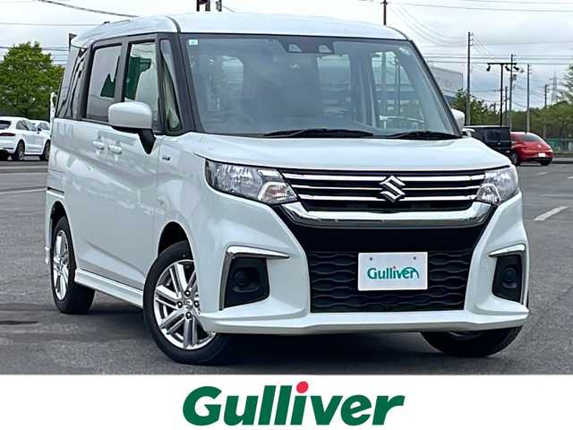 スズキ ソリオ HV MZ 道央・札幌 2024(令6)年 1.4万km ピュアホワイトP ４WD/社外メモリーナビ/AM/FM/BT/スズキセーフティサポート/衝突被害軽減ブレーキ/横滑り防止装置/レーダークルーズコントロール/レーンキープアシスト/リヤパーキングセンサー/バックカメラ/ETC/アイドリングストップ/片側パワースライドドア/前席シートヒーター/ステアリングリモコン/プッシュスタート/スマートキー/ハロゲンヘッドライト/オートライト/オートハイビーム/ヘッドライトレベライザー/電動格納ミラー/ヒーテッドドアミラー/フロアマット/レンタカー登録