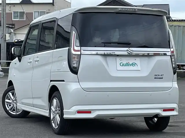 スズキ ソリオ HV MZ 道央・札幌 2024(令6)年 1.4万km ピュアホワイトP ４WD/社外メモリーナビ/AM/FM/BT/スズキセーフティサポート/衝突被害軽減ブレーキ/横滑り防止装置/レーダークルーズコントロール/レーンキープアシスト/リヤパーキングセンサー/バックカメラ/ETC/アイドリングストップ/片側パワースライドドア/前席シートヒーター/ステアリングリモコン/プッシュスタート/スマートキー/ハロゲンヘッドライト/オートライト/オートハイビーム/ヘッドライトレベライザー/電動格納ミラー/ヒーテッドドアミラー/フロアマット/レンタカー登録