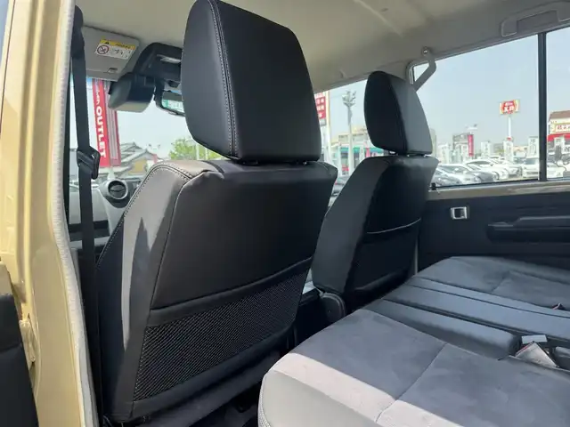 トヨタ ランドクルーザー AX 三重県 2025(令7)年 0.2万km ベージュ ワンオーナー/OPモデリスタストライプテープ/セーフティセンス/デュアルモードオートマチックロッキングハブ付パートタイム4WD/電動デフロック(フロント/リア) /バックモニター内蔵自動防眩インナーミラー/クルーズコントロール/合成/ファブリックコンビシート/carozzeriaオーディオ/ETC/純正16インチアルミホイール/LEDヘッドランプ/・オートライト/オートマチックハイビーム/キーレスエントリー/スペアキー×1/新車時保証書/取扱説明書