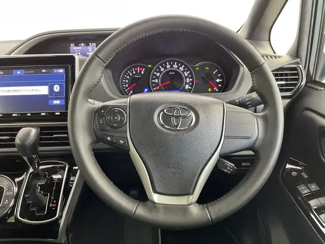 トヨタ ヴォクシー ZS 煌Ⅲ 愛知県 2021(令3)年 2万km イナズマスパーキングブラックガラスフレーク 純正９型ナビ/・Bluetooth/・CD/DVD/・フルセグテレビ/・USB接続/・SD音楽録音/バックカメラ/純正フリップダウンモニター/両側パワースライドドア/衝突軽減ブレーキ/レーンキープアシスト/オートマチックハイビーム/コーナーセンサー/クルーズコントロール/ハーフレザーシート/ビルトインＥＴＣ２．０