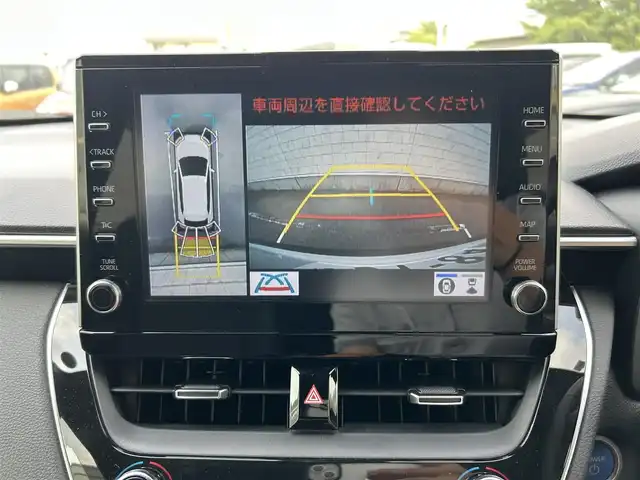 トヨタ カローラ クロス ハイブリッド Z 静岡県 2023(令5)年 2.6万km パール パノラマルーフ/パノラミックビューモニター/9インチディスプレイオーディオ/（ナビ・フルセグTV・AppleCarPlay・AndroidAuto）/トヨタセーフティセンス/・プリクラッシュセーフティ/・レーンキープアシスト/・横滑り防止装置/ブラインドスポットモニター/アクセサリーコンセント１５００W/パワーバックドア/ハーフレザーシート/前席シートヒーター/D席パワーシート/ステアリングヒーター/レーダークルーズコントロール/オートブレーキホールド/電動パーキングブレーキ/純正アルミホイール/純正フロアマット/スマートキー/スペアキー1本/置くだけ充電/保証書/取扱説明書
