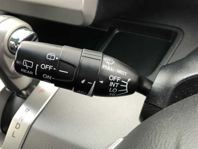 ホンダ フリード ハイブリット ジャストセレクション 愛知県 2012(平24)年 6.4万km プレミアムホワイトパール 社外7インチナビ/横滑り防止装置/クルーズコントロール/革巻きステアリング/HIDライト/オートライト/両側パワースライドドア/ETC/純正AW/純正フロアマット/プッシュスタート/スマートキー/スペアキー