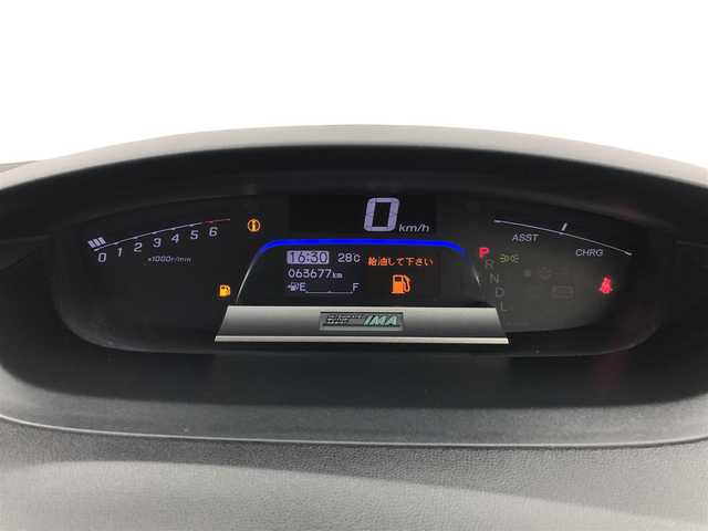 ホンダ フリード ハイブリット ジャストセレクション 愛知県 2012(平24)年 6.4万km プレミアムホワイトパール 社外7インチナビ/横滑り防止装置/クルーズコントロール/革巻きステアリング/HIDライト/オートライト/両側パワースライドドア/ETC/純正AW/純正フロアマット/プッシュスタート/スマートキー/スペアキー
