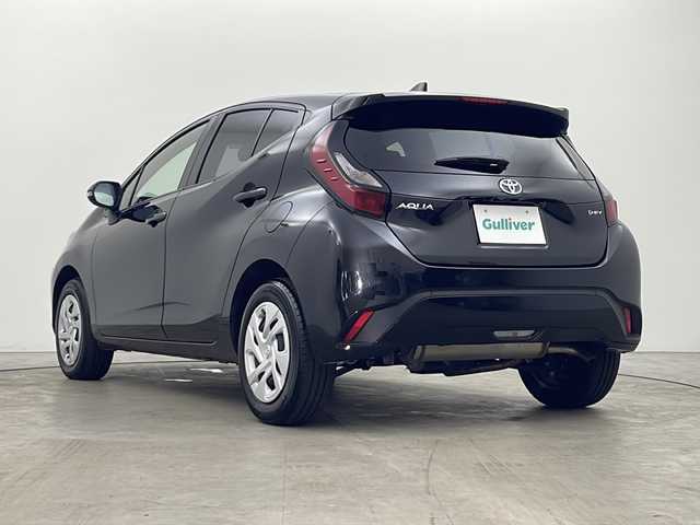 トヨタ アクア G 秋田県 2024(令6)年 2万km ブラックマイカ 4WD/純正メモリナビ　/AM/FM/Bluetooth/バックカメラ　/衝突被害軽減システム　/レーダークルーズコントロール　/レーンキープアシスト　/横滑り防止装置　/寒冷地仕様　/ワイパーデアイサー　/LEDヘッドライト　/ETC　/プッシュスタート/スペアキー/前後コーナーセンサー/AC１００V/オートマチックハイビーム/電動格納ミラー/純正ホイールキャップ
