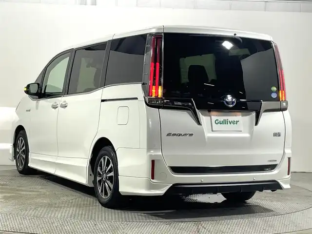 トヨタ エスクァイア ハイブリッド Gi プレミアムパッケージ ブラックテーラード 大阪府 2019(平31)年 3.1万km ホワイトパールクリスタルシャイン TRDエアロ/フロントグリル 10incナビTV バックカメラ ハーフレザー シートヒーター クルーズコントロール 衝突軽減ブレーキ レーンアシスト オートハイビーム 両側パワースライドドア ドライブレコーダー ETC