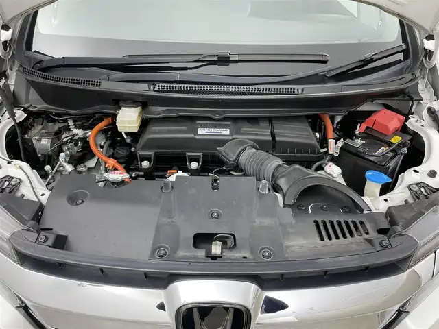 ホンダ ステップワゴン スパーダ eHEV G ホンダS 岡山県 2021(令3)年 2.9万km プラチナホワイトパール 社外８インチメモリナビゲーション【MDV-S706L】/　（CD/DVD/フルセグTV/BT/USB）/社外12.1インチフリップダウンモニター/バックカメラ/両側パワースライドドア/追従型クルーズコントロール/LEDヘッドライト（AUTO機能付き）/ビルトインETC/衝突軽減ブレーキシステム/車線逸脱防止システム/横滑り防止装置/社外ドライブレコーダー（前後）/純正16インチアルミホイール/純正フロアマット/プッシュスタート/スマートキー/新車保証書/取扱説明書/スペアキー×１