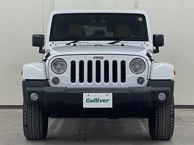 クライスラー・ジープ ジープ ラングラー アンリミテッド サハラ 道央・札幌 2015(平27)年 6.2万km 白 /4WD//社外ナビ/（CD/DVD/FM/AM/BT/AUX）//クルーズコントロール//バックカメラ//サイドモニター//ETC//全席シートカバー//オートライト//フォグライト//革巻きステアリング//ダウンヒルアシスト//横滑り防止装置