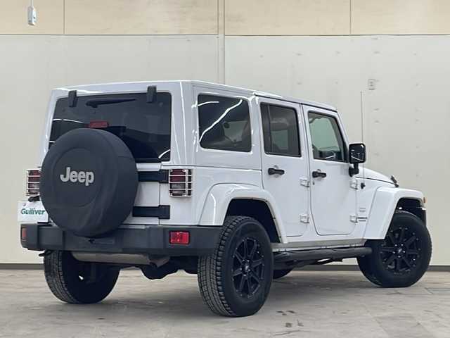 クライスラー・ジープ ジープ ラングラー アンリミテッド サハラ 道央・札幌 2015(平27)年 6.2万km 白 /4WD//社外ナビ/（CD/DVD/FM/AM/BT/AUX）//クルーズコントロール//バックカメラ//サイドモニター//ETC//全席シートカバー//オートライト//フォグライト//革巻きステアリング//ダウンヒルアシスト//横滑り防止装置