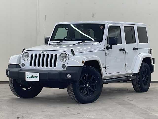 クライスラー・ジープ ジープ ラングラー アンリミテッド サハラ 道央・札幌 2015(平27)年 6.2万km 白 /4WD//社外ナビ/（CD/DVD/FM/AM/BT/AUX）//クルーズコントロール//バックカメラ//サイドモニター//ETC//全席シートカバー//オートライト//フォグライト//革巻きステアリング//ダウンヒルアシスト//横滑り防止装置