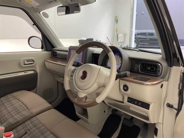 スズキ ラパン ＬＣ X 滋賀県 2024(令6)年 0.6万km フォーンベージュメタリック/アーバンブラウン 2トーン 純正7インチディスプレイオーディオ/【AppleCarPlay/AndroidAuto】/ハーフレザーシート/リアソナー/バックカメラ/LEDヘッドライト/D/Nシートヒーター/衝突軽減ブレーキ/レーンキープアシスト/スペアキー/スマートキー