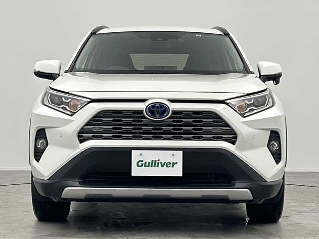 トヨタ ＲＡＶ４ ハイブリッドG 三重県 2019(令1)年 5.1万km ホワイトパールクリスタルシャイン 禁煙車/純正9インチナビ/CD/DVD/BT/MSV/フルセグTV/USB/バックカメラ/トヨタセーフティセンス/BSM/オートハイビーム/合皮シート/パワーシート/シートヒーター/パワーバックドア/レーダークルーズコントロール/ステアリングヒーター/ビルトインETC/電子サイドブレーキ/純正ドライブレコーダー/アルミ付きスタッドレスタイヤ積込/クリアランスソナー/取扱説明書