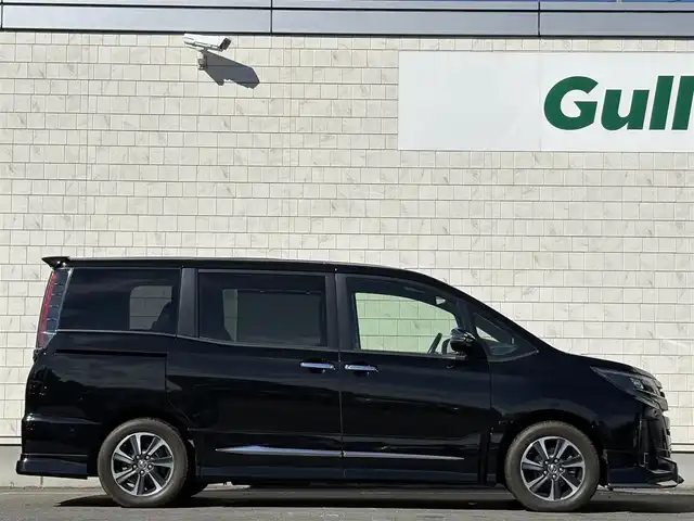 トヨタ ノア Si ダブルバイビー 岩手県 2017(平29)年 5.5万km ブラック ４WD/モデリスタエアロ(F.S.R)/ハーフレザー/両側パワースライドドア/寒冷地仕様/純正10インチナビ/→フルセグTV/Bluetooth/CD/DVD/FM/AM/バックカメラ/ステアリングスイッチ/トヨタセーフティセンス/プリクラッシュセーフティ/フロントワイパーデアイサー/〇プッシュスタート/〇電動格納ミラー/〇ドアバイザー/〇フロアマット/〇シガーソケット/オートライト/LEDヘッドライト/フォグライト/ドライブレコーダー/ETC