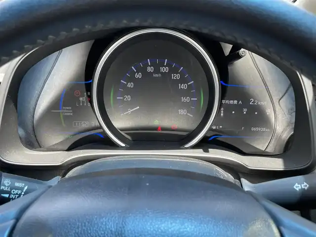 ホンダ フィット ハイブリット Lパッケージ 滋賀県 2014(平26)年 6.6万km クリスタルブラックパール 禁煙車/純正ナビ/（CD/DVD/BT/ワンセグ）/ETC/前方ドライブレコーダー/バックカメラ/クルーズコントロール/ハーフレザー/LEDヘッドライト/オートライト/ステアリングスイッチ/純正アルミホイール
