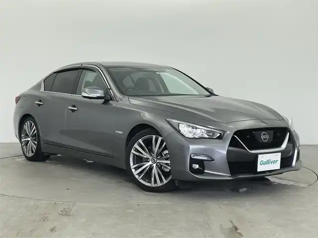 日産 スカイライン ハイブリッド GT タイプSP 富山県 2020(令2)年 3.8万km ダークメタルグレー 純正ナビ（AM/FM/DVD/BT/USB/フルセグ）/全方位カメラ/ETC/BSW（後側方車両検知警報）/衝突被害軽減システム/レーダークルーズコントロール/レーンキープアシスト/コーナーセンサー/横滑り防止装置/アイドリングストップ/レザーシート/D/N席パワーシート/D席メモリシート/シートヒーター/純正アルミホイール/純正フロアマット/オートLEDライト/オートホールド付電子パーキング/革巻きステアリング/ステアリングスイッチ/パドルシフト/スマートキー/スペアキー