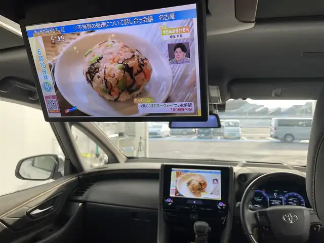 トヨタ アルファードハイブリット Z 愛知県 2024(令6)年 1.7万km プラチナホワイトパールマイカ 左右独立ムーンルーフ/13.2型有機EL後席ディスプレイ/14インチHDディスプレイオーディオ/(フルセグTV/BT/AM/FM)/合皮シート/前席＋二席目シートヒーター/前席＋二席目シートベンチレーション/全自動サンシェード/前後ドライブレコーダー/3眼LEDヘッドライト/ユニバーサルステップ/デジタルインナーミラー/トヨタセーフティセンス/・レーントレーシングアシスト/・プリクラッシュセーフティ/・ヘッドアップディスプレイ/・オートマチックハイビーム/・ブラインドスポットモニター/・クリアランスソナー/・パーキングサポートブレーキ/・アダクティブクルーズコントロール/ETC2.0/電動リアゲート/両側パワースライドドア/純正18インチAW/AC100V充電ソケット