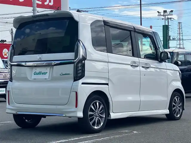 ホンダ Ｎ ＢＯＸ カスタム EX 静岡県 2022(令4)年 3.4万km プラチナホワイトパール エンジンスタートボタン/保証書/取扱説明書/パワーステアリング/パワーウィンドウ/アイドリングストップ/スマートキー（スペアキー1本）/AAC/クルーズコントロール/バックカメラ/純正SDナビ（フルセグTV、BT接続、DVD再生機能、CDチェンジャー）/USB入力端子/ビルトインETC/ウォークスルー/純正フロアマット/純正アルミホイール/布系シート/D+N席シートヒーター/両側パワースライドドア/ABS/横滑り防止装置/コーナーセンサー/レーンキープアシスト/オートライト/オートマチックハイビーム/LEDヘッドライト/W+サイドエアバッグ/衝突軽減システム/カーテンエアバック