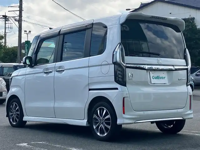 ホンダ Ｎ ＢＯＸ カスタム EX 静岡県 2022(令4)年 3.4万km プラチナホワイトパール エンジンスタートボタン/保証書/取扱説明書/パワーステアリング/パワーウィンドウ/アイドリングストップ/スマートキー（スペアキー1本）/AAC/クルーズコントロール/バックカメラ/純正SDナビ（フルセグTV、BT接続、DVD再生機能、CDチェンジャー）/USB入力端子/ビルトインETC/ウォークスルー/純正フロアマット/純正アルミホイール/布系シート/D+N席シートヒーター/両側パワースライドドア/ABS/横滑り防止装置/コーナーセンサー/レーンキープアシスト/オートライト/オートマチックハイビーム/LEDヘッドライト/W+サイドエアバッグ/衝突軽減システム/カーテンエアバック