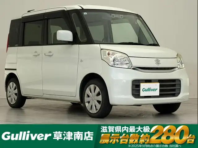 スズキ スペーシア X 滋賀県 2015(平27)年 8.5万km クリスタルホワイトP 社外8インチナビ/(CD/DVD/Bluetooth/フルセグTV)/バックカメラ/衝突軽減ブレーキ/両側電動スライドドア/シートヒーター/前後ドライブレコーダー/ETC/車線逸脱警報/HIDヘッドライト/オートライト/プッシュスタート/スマートキー