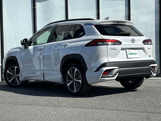 トヨタ カローラ クロス ハイブリッド Z 山形県 2025(令7)年 0.7万km プラチナホワイトパールマイカ 純正ナビ/（AM/FM/フルセグ/BT）/ガラスルーフ/ステアリングスイッチ/レーダークルーズコントロール/パーキングアシスト/全周囲カメラ/モデリスタエアロ（Fスポイラー）/前後コーナーセンサー/前席シートヒーター/運転席パワーシート/電動パーキング/オートブレーキホールド/電動リアゲート/ビルトインETC2.0/BSM/電動格納ミラー/ルーフレール