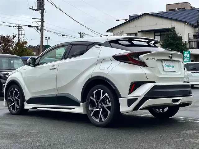 トヨタ Ｃ－ＨＲ G 静岡県 2017(平29)年 5.1万km ホワイトパールクリスタルシャイン フルモデリスタエアロ/ALPINE製9インチナビ/バックカメラ/保証書/取扱説明書/エンジンスタートボタン/パワーステアリング/パワーウィンドウ/アイドリングストップ/スマートキー/オートエアコン/レーダークルーズコントロール/ETC/純正フロアマット/純正アルミホイール/ハーフレザーシート/D席N席シートヒーター/ABS/横滑り防止装置/コーナーセンサー前後/レーンキープアシスト/オートライト/オートマチックハイビーム/LEDヘッドライト/W+サイドエアバッグ/衝突軽減システム/カーテンエアバッグ/BSM/HDMI接続