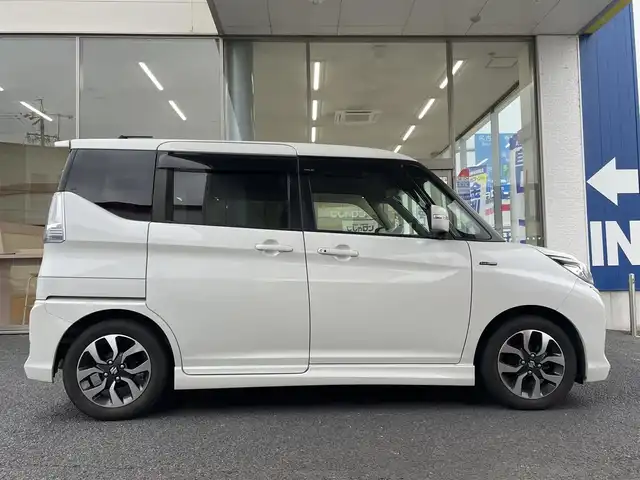 スズキ ソリオ バンディット HV SV 岐阜県 2017(平29)年 8.5万km ピュアホワイトP (株)IDOMが運営する【じしゃロン多治見店】の自社ローン対象車両になります。こちらは現金ご利用時の価格です。自社ローンご希望の方は別途その旨お申付け下さい。/フルハイブリッド/デュアルカメラブレーキサポート/車線逸脱警報/純正パナソニックSDナビ/HDMI・DVD・Bluetooth・フルセグTV・SDREC/バックカメラ/運転席シートヒーター/左パワースライドドア/LEDヘッドライト/社外ドライブレコーダー/後席スライドシート/スライドドアロールブラインド/クルーズコントロール