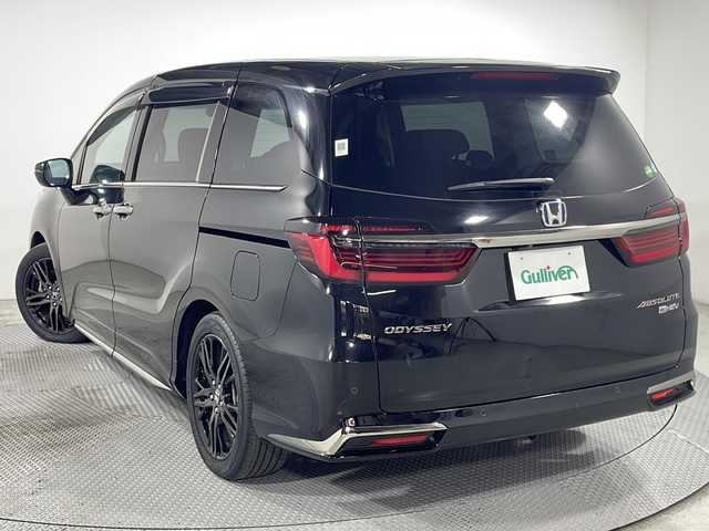 ホンダ オデッセイ ハイブリッド e:HEVアブソルート EX 広島県 2021(令3)年 4.4万km プレミアムスパークルブラックパール 禁煙車/純正１０型ナビ/全周囲カメラ/シートヒーター/１５００Ｗ給電/電動リアゲート/パワーシート/ブラインドスポットモニター/パーキングアシスト/両側パワースライドドア/レーダークルーズコントロール/ＥＴＣ２．０/エアバッグ(運転席/助手席/サイド/カーテン)/純正18インチアルミホイール(225/50/R18)