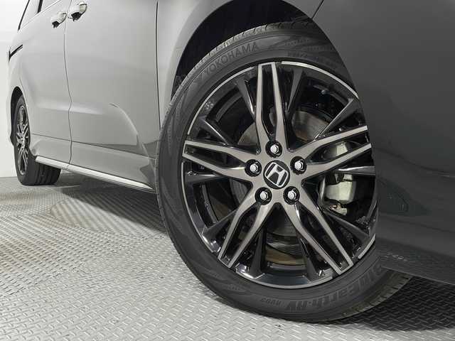 ホンダ オデッセイ ハイブリッド e:HEVアブソルート EX 広島県 2021(令3)年 4.4万km プレミアムスパークルブラックパール 禁煙車/純正１０型ナビ/全周囲カメラ/シートヒーター/１５００Ｗ給電/電動リアゲート/パワーシート/ブラインドスポットモニター/パーキングアシスト/両側パワースライドドア/レーダークルーズコントロール/ＥＴＣ２．０/エアバッグ(運転席/助手席/サイド/カーテン)/純正18インチアルミホイール(225/50/R18)