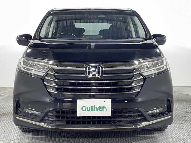 ホンダ オデッセイ ハイブリッド e:HEVアブソルート EX 広島県 2021(令3)年 4.4万km プレミアムスパークルブラックパール 禁煙車/純正１０型ナビ/全周囲カメラ/シートヒーター/１５００Ｗ給電/電動リアゲート/パワーシート/ブラインドスポットモニター/パーキングアシスト/両側パワースライドドア/レーダークルーズコントロール/ＥＴＣ２．０/エアバッグ(運転席/助手席/サイド/カーテン)/純正18インチアルミホイール(225/50/R18)