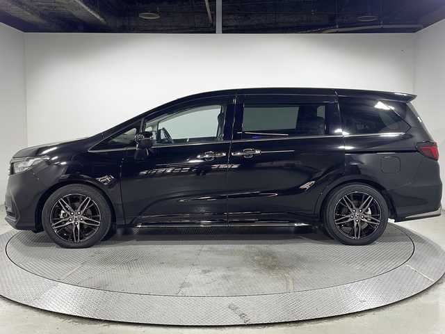 ホンダ オデッセイ ハイブリッド e:HEVアブソルート EX 広島県 2021(令3)年 4.4万km プレミアムスパークルブラックパール 禁煙車/純正１０型ナビ/全周囲カメラ/シートヒーター/１５００Ｗ給電/電動リアゲート/パワーシート/ブラインドスポットモニター/パーキングアシスト/両側パワースライドドア/レーダークルーズコントロール/ＥＴＣ２．０/エアバッグ(運転席/助手席/サイド/カーテン)/純正18インチアルミホイール(225/50/R18)