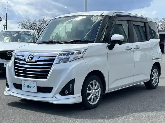 トヨタ ルーミー カスタムG 青森県 2018(平30)年 6.9万km パールホワイトⅢ ・4WD/・寒冷地仕様/・純正ナビ/・バックカメラ/・両側パワースライドドア/・衝突軽減ブレーキ/・ワイパーデアイサー/・オートライト/・オートマチックハイビーム/・LEDヘッドライト/・スマートキー/・横滑り防止/・ビルトインETC/・純正フロアマット/・純正ドアバイザー/・夏タイヤホイール付き積み込み/・盗難防止装置/・保証書/・取扱説明書