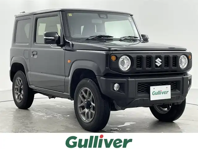 スズキ ジムニー XC 福井県 2023(令5)年 0.5万km ブルーイッシュブラックパール3 ALPINEフローティングディスプレイオーディオ/Bluetooth/USB/AppleCarPlay/AndroidAuto/AM/FM/スズキセーフティーサポート/・デュアルセンサーブレーキサポート/・車線逸脱警報機能/・標識認識機能/・誤発進抑制機能/・ふらつき警報機能/・先行車発進お知らせ機能/クルーズコントロール/プッシュスタート/スペアキー/シートヒーター /オートライト /LED/フォグライト/ヘッドライトウォッシャー/革巻きステアリング/ステアリングチルド機構/背面タイヤ/純正１６インチアルミ