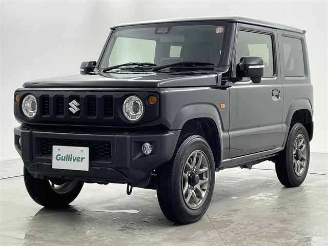 スズキ ジムニー XC 福井県 2023(令5)年 0.5万km ブルーイッシュブラックパール3 ALPINEフローティングディスプレイオーディオ/Bluetooth/USB/AppleCarPlay/AndroidAuto/AM/FM/スズキセーフティーサポート/・デュアルセンサーブレーキサポート/・車線逸脱警報機能/・標識認識機能/・誤発進抑制機能/・ふらつき警報機能/・先行車発進お知らせ機能/クルーズコントロール/プッシュスタート/スペアキー/シートヒーター /オートライト /LED/フォグライト/ヘッドライトウォッシャー/革巻きステアリング/ステアリングチルド機構/背面タイヤ/純正１６インチアルミ