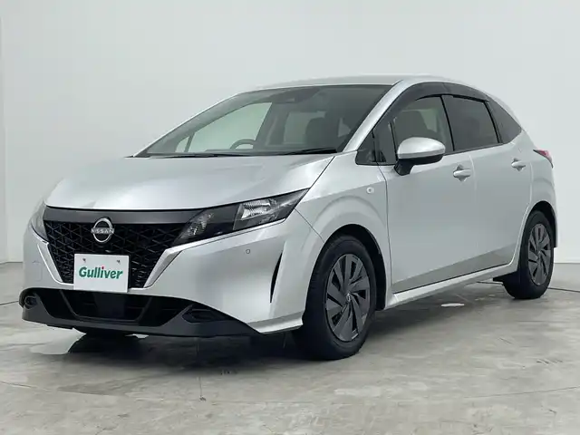 日産 ノート S 三重県 2021(令3)年 2.1万km ブリリアントシルバー 禁煙車　/純正９インチメモリーナビ/・フルセグTV/・CD/BT/SD/エマージェンシーブレーキ　/車線逸脱防止装置　/前後コーナーセンサー　/バックカメラ　/社外前方ドライブレコーダー　/サイド／カーテンエアバッグ　/純正ビルトインＥＴＣ/オートAC/電子サイドブレーキ/ブレーキオートホールド