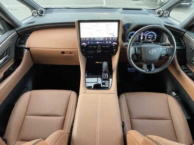 トヨタ ヴェルファイア ハイブリット Z プレミア 東京都 2024(令6)年 1.7万km プラチナホワイトパールマイカ 左右独立ムーンルーフ/トヨタチームメイト/・アドバンストパーク/・パーキングサポートブレーキ（周辺静止物）/・アドバンストドライブ/・緊急時操舵支援/・フロントクロストラフィックアラート/・レーンチェンジアシスト/・ドライバーモニターカメラ/セーフティセンス/・プリクラッシュセーフティ/・レーントレーシングアシスト/・全車速追従機能付レーダークルーズコントロール/・アダプティブハイビームシステム/・ロードサインアシスト/・ドライバー異常時対応システム/・プロアクティブドライビングアシスト/・発進遅れ告知機能/BSM/パーキングサポートブレーキ/12インチフリップダウンモニター/14インチディスプレイオーディオ/・車載ナビ/・地デジTV/・USB/HDMI/・AppleCarPlay/AndroidAuto/・ETC2.0/床下透過表示機能付パノラミックビューモニター/ヘッドアップディスプレイ/ドライブレコーダー/両側パワースライドドア/パワーバックドア/本革シート/シートヒーター/ベンチレーション/ステアリングヒーター