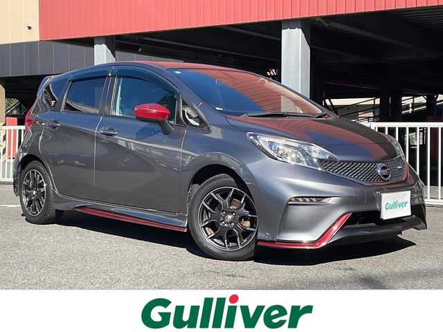 日産 ノート ニスモ 神奈川県 2015(平27)年 5万km ダークメタルグレー スーパーチャージャー/純正SDナビ【MC315D-W】/・DTV/CD/DVD/BT/AUX		/バックカメラ/ETC			/純正16インチAW/ルーフエンドスポイラー/オートライト/純正LEDヘッドライト/バックフォグ			/プッシュEgスタート/ストップ/インテリジェントキー×2			/ターンランプ付電動格納ドアミラー/ドアバイザー/純正フロアマット/取扱説明書/ナビ取扱説明書/新車時保証書