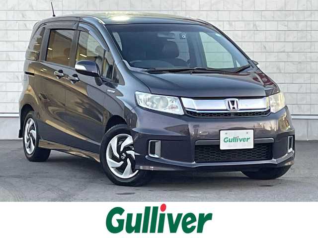 ホンダ フリード スパイク ハイブリット プレミアムエディション 群馬県 2015(平27)年 7万km グラマラスモーブP 純正8インチナビ/・AM/FM/フルセグTV/・CD/DVD/MSV/・Bluetooth/SD/横滑り防止/オートライト/クルーズコントロール/バックカメラ/両側電動スライドドア/ETC/純正フロアマット/純正ドアバイザー/スマートキー