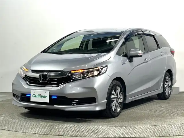 ホンダ シャトル ハイブリッド ホンダセンシング 大阪府 2019(令1)年 3.7万km ルナシルバーM 社外ナビ(地デジ/Bluetooth) 衝突軽減 バックカメラ ETC レーダークルコン レーンアシスト スマートキー プッシュスタート オートエアコン 電格ミラー 横滑り防止 ABS 禁煙車