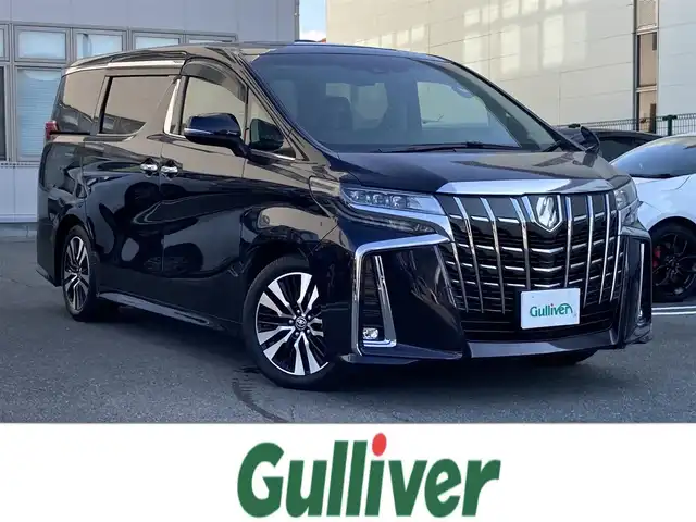 トヨタ アルファード S Cパッケージ 福岡県 2019(令1)年 2.5万km スパークリングブラックパールクリスタルシャイン ・ツインムーンルーフ/・3眼LEDヘッドランプ/・LEDシーケンシャルターンランプ/・LEDコーナリングランプ/・Toyota Safety Sense/・プリクラッシュセーフティ（歩行者［昼夜］・自転車運転者［昼］検知機能付衝突回避支援タイプ/ミリ波レーダー＋単眼カメラ方式）/・レーントレーシングアシスト［LTA］/・レーダークルーズコントロール（全車速追従機能付）/・ロードサインアシスト［RSA］/・アダプティブハイビームシステム［AHS］/・オートマチックハイビーム［AHB］/・先行車発進告知機能［TMN］/・ブラインドスポットモニター［BSM］/・リヤクロストラフィックアラート［RCTA］/・インテリジェントクリアランスソナー/・レーダークルーズコントロール/・社外9インチナビ&Bluetooth&CD/DVD&TV/・フリップダウンモニター/・バックカメラ/・ビルドインETC/・両側パワースライドドア/・合皮シート/・パワーシート（一列目・二列目）/・シートヒーター/エアシート（運転席・助手席）/・電動リアゲート/・前後ドライブレコーダー/・オットマン/・純正18インチアルミホイール/・3眼LEDライト/・ステアリングヒーター/・nanoe
