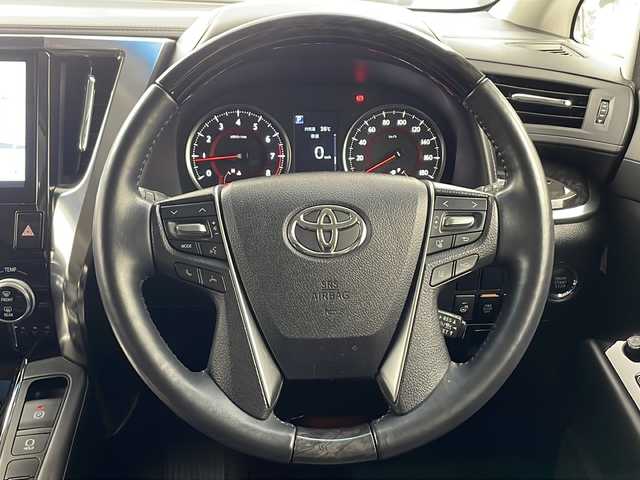 トヨタ アルファード S Cパッケージ 福岡県 2019(令1)年 2.5万km スパークリングブラックパールクリスタルシャイン ・ツインムーンルーフ/・3眼LEDヘッドランプ/・LEDシーケンシャルターンランプ/・LEDコーナリングランプ/・Toyota Safety Sense/・プリクラッシュセーフティ（歩行者［昼夜］・自転車運転者［昼］検知機能付衝突回避支援タイプ/ミリ波レーダー＋単眼カメラ方式）/・レーントレーシングアシスト［LTA］/・レーダークルーズコントロール（全車速追従機能付）/・ロードサインアシスト［RSA］/・アダプティブハイビームシステム［AHS］/・オートマチックハイビーム［AHB］/・先行車発進告知機能［TMN］/・ブラインドスポットモニター［BSM］/・リヤクロストラフィックアラート［RCTA］/・インテリジェントクリアランスソナー/・レーダークルーズコントロール/・社外9インチナビ&Bluetooth&CD/DVD&TV/・フリップダウンモニター/・バックカメラ/・ビルドインETC/・両側パワースライドドア/・合皮シート/・パワーシート（一列目・二列目）/・シートヒーター/エアシート（運転席・助手席）/・電動リアゲート/・前後ドライブレコーダー/・オットマン/・純正18インチアルミホイール/・3眼LEDライト/・ステアリングヒーター/・nanoe