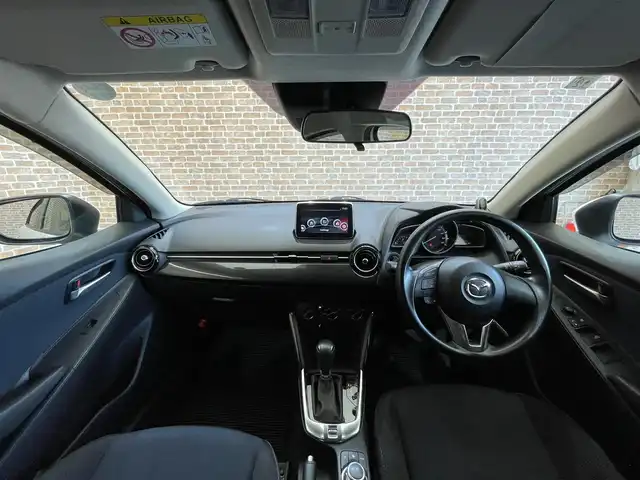 マツダ デミオ 13S 岩手県 2015(平27)年 5.6万km アークティックホワイト ４WD/スマートシティブレーキアシスト/MTモード付きAT/コーナーセンサー/横滑り防止装置/ヘッドライトレベライザー/アイドリングストップ/純正ナビ（Bluetooth USB）/ステアリングスイッチ/ドアミラーウインカー/ドアバイザー/スペアキー/カーテンエアバック/社外フロアマット