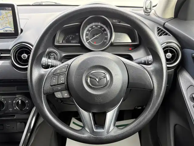 マツダ デミオ 13S 岩手県 2015(平27)年 5.6万km アークティックホワイト 禁煙車/４WD/スマートシティブレーキアシスト/MTモード付きAT/コーナーセンサー/横滑り防止装置/ヘッドライトレベライザー/純正ナビ/→Bluetooth/FM/AM/USB/ステアリングスイッチ/〇プッシュスタート/〇電動格納ミラー/〇ドアバイザー/〇フロアマット/〇シガーソケット/〇スマートキー