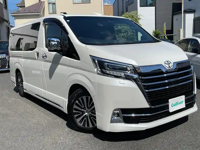 トヨタ グランエース プレミアム 神奈川県 2024(令6)年 1.8万km ホワイトパールクリスタルシャイン 黒革シート/純正メモリーナビ・地デジTV/純正12.1インチフリップダウンモニター/パノラマモニター/ビルトインETC2.0/デジタルインナーミラー/両側パワースライドドア/バックドアイージークローザードア/トヨタセーフティセンス/レーダークルーズコントロール/PCS/LDA/BSM/RCTA/PKSB/RSA/コーナーセンサー/オートハイビーム/純正17インチAW/RS-Rダウンサス(純正積み込み)/LEDライト/LEDフォグライト/前席パワーシート/シートヒーター/ウッドコンビハンドル/アイドリングストップ/オート電格ミラー/プッシュスタート/スマートキー×2/保証書・取説あり