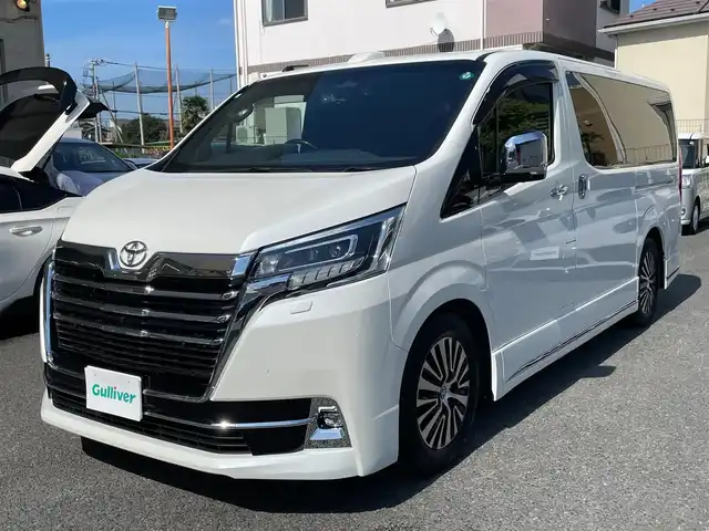 トヨタ グランエース プレミアム 神奈川県 2024(令6)年 1.8万km ホワイトパールクリスタルシャイン 黒革シート/純正メモリーナビ・地デジTV/純正12.1インチフリップダウンモニター/パノラマモニター/ビルトインETC2.0/デジタルインナーミラー/両側パワースライドドア/バックドアイージークローザードア/トヨタセーフティセンス/レーダークルーズコントロール/PCS/LDA/BSM/RCTA/PKSB/RSA/コーナーセンサー/オートハイビーム/純正17インチAW/RS-Rダウンサス(純正積み込み)/LEDライト/LEDフォグライト/前席パワーシート/シートヒーター/ウッドコンビハンドル/アイドリングストップ/オート電格ミラー/プッシュスタート/スマートキー×2/保証書・取説あり